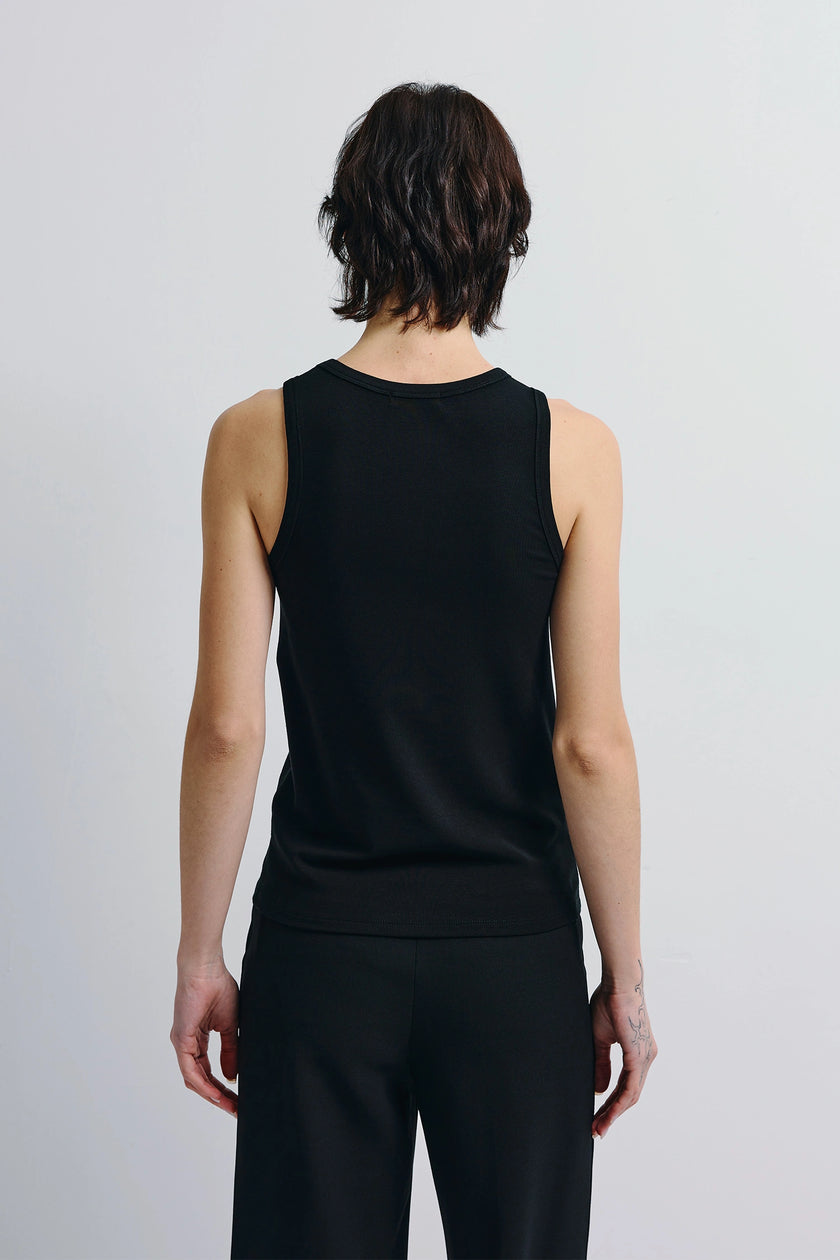 Black Béri High Neck Tank Top, high-neck wool-blend tank and minimalist black pants outfit