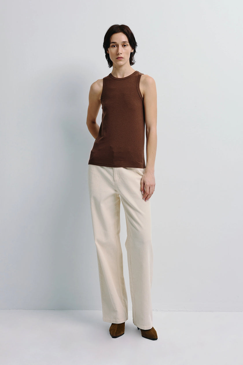 Béri High Neck Tank Top in brown stretch wool blend with cream pants