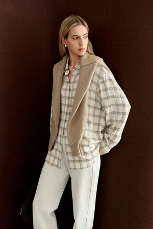 Three-quarter view of Rue Sophie’s Elouet Plaid Oversized Shirt in Ivory Plaid, highlighting the pointed collar, relaxed fit and oversized sleeves.