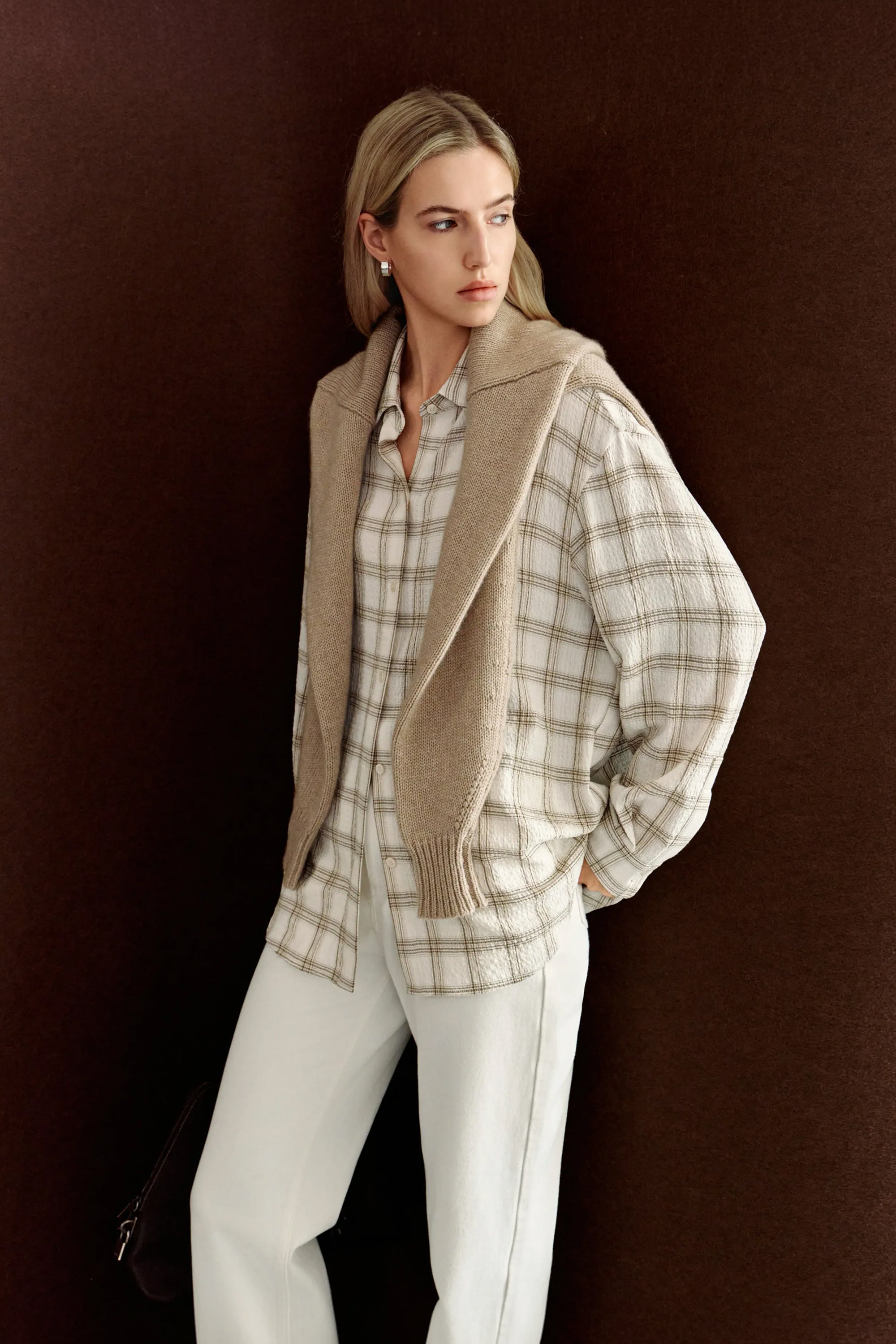 Three-quarter view of Rue Sophie’s Elouet Plaid Oversized Shirt in Ivory Plaid, highlighting the pointed collar, relaxed fit and oversized sleeves.