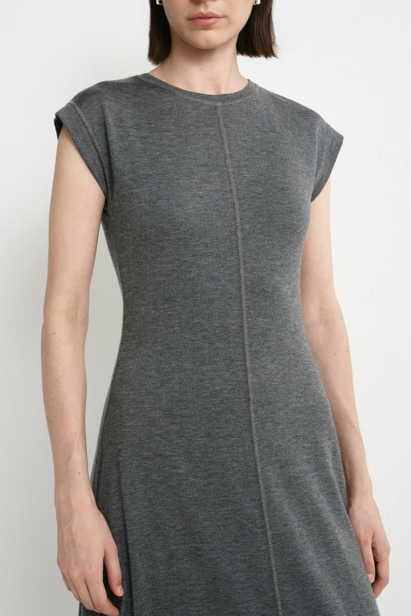 Close-up of the Rue Sophie Avi Out Stitched Dress in heather charcoal, highlighting the round neckline, cap sleeves, soft knit texture, and exposed center-front stitching.