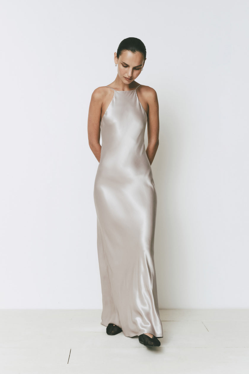 Silver satin floor-length Villa dress with high neck and open back for special events